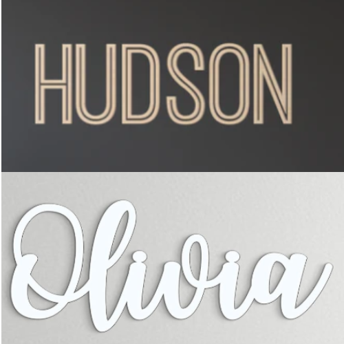 Two custom wood signs displaying the names 'Hudson' and 'Olivia' in different fonts and styles. 'Hudson' is in a bold, arched script, and 'Olivia' is in a flowing, cursive script.