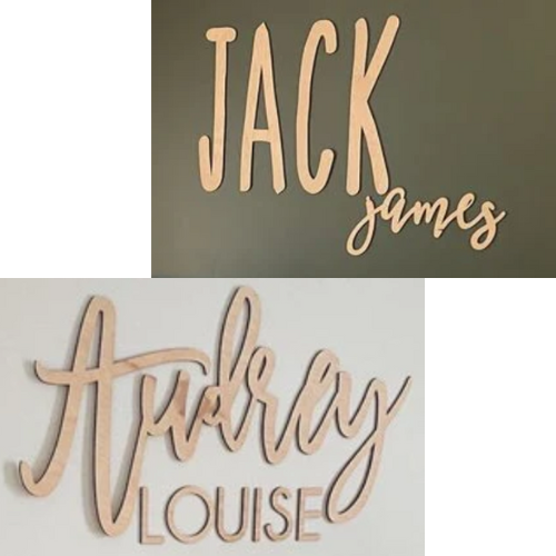 Two wooden signs with custom double names. The top sign reads 'JACK james' in a cursive script, and the bottom sign reads 'Audrey Louise' in a combination of script and print styles.