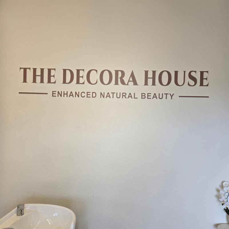 Simple and serene salon identification.