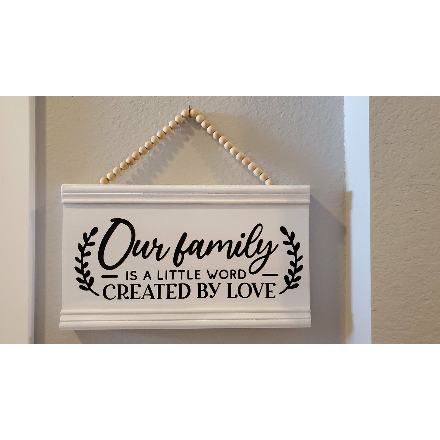 Our Family sign with beaded hanger
